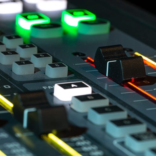 digital-mixer-in-a-recording-studio-close-up-scaled.jpg